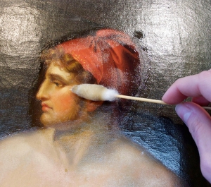 Painting being cleaned