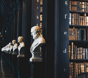 Classic busts in the library stacks